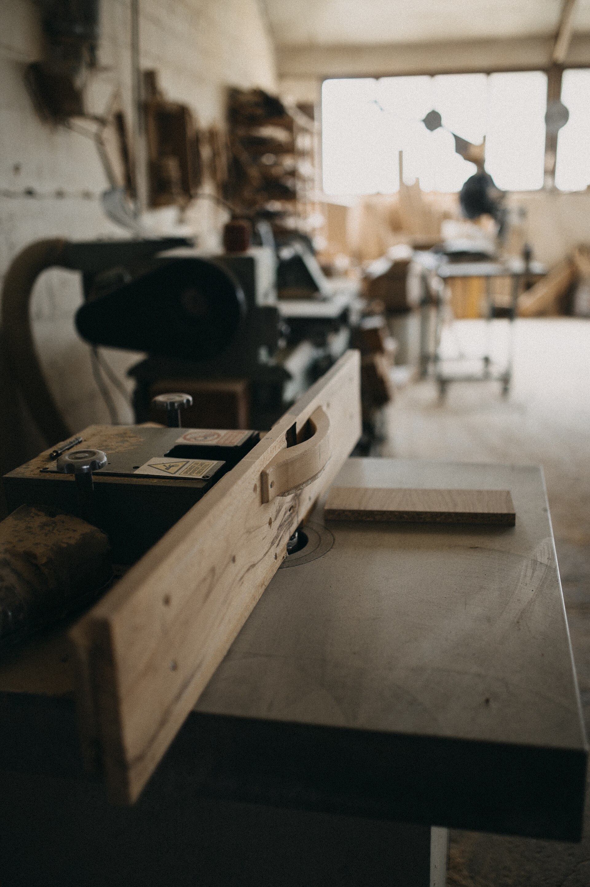 Detailed woodworking craftsmanship with tools in use